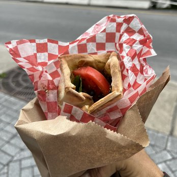 Chez Fourna - Zaatar manaish with tomato, mint and olives - Lebanese Near Me - Montreal, Quebec