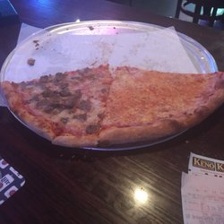 Grand Slam Pizza and Pub - Half devoured pizza!!!  if your looking for bar pizza this is not but if u want a light thin crust pizza with flavor