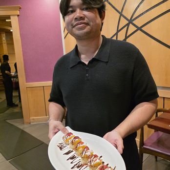 Cafe Asia 2 - My second Indonesian friendly server serving me the Banana Basket dessert. His excellent customer service was  tops. - Sushi Bars Near Me - Roanoke, Virginia