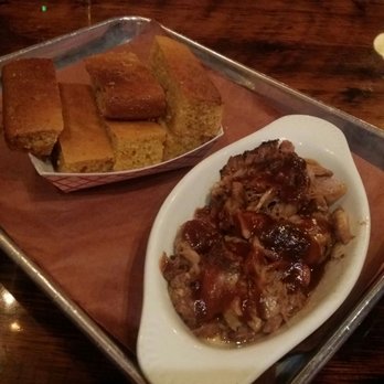 Butcher Bar - Smoked Pulled Pork + Cornbread w/ Honey Butter....you get a free side order when you check in on Yelp so my Cornbread was free! - Barbeque Near Me - Astoria, New York