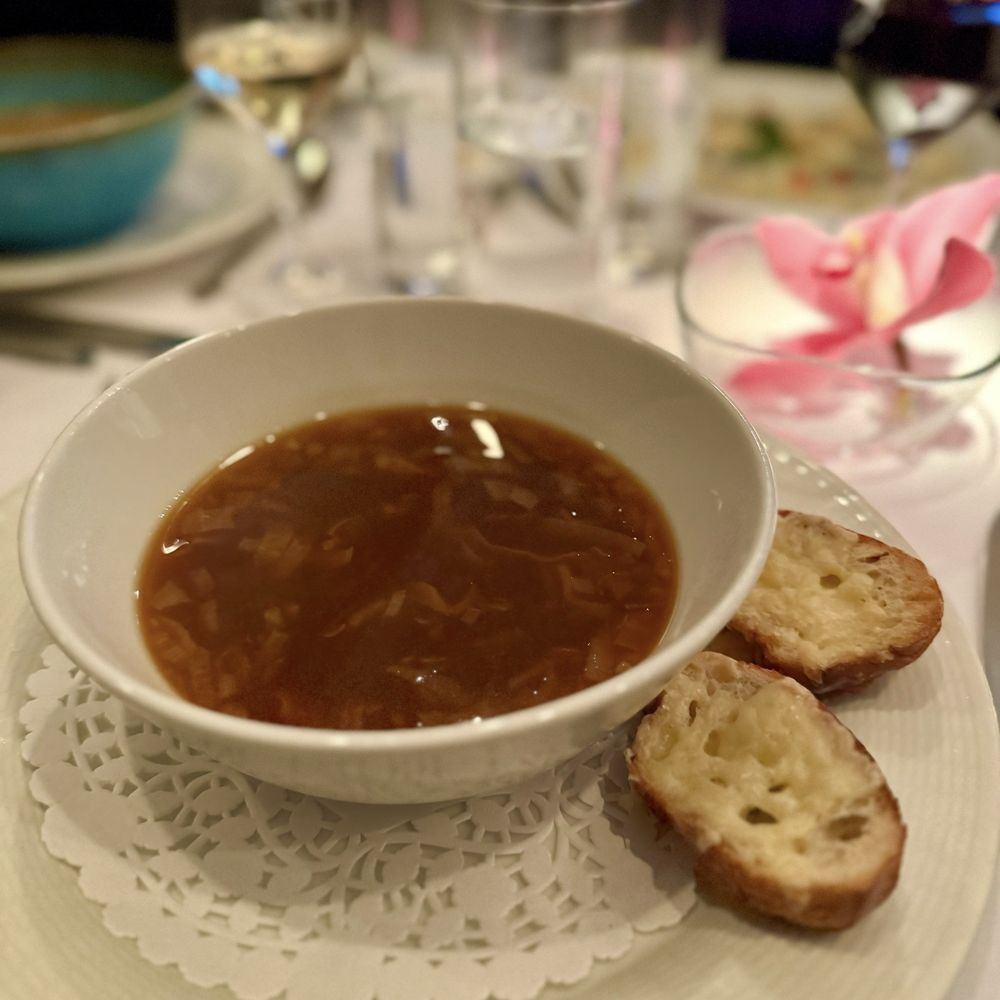 Restaurant Bonaparte - Onion broth, soup with aged gratin cheddar toast - French Near Me - Montreal, Quebec Restaurant Bonaparte - Onion broth, soup with aged gratin cheddar toast - French Near Me - Montreal, Quebec