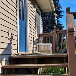 KJ Home Improvement - Before shot of the upper deck stairs