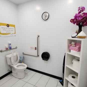 Mount Sinai - a bathroom with a toilet and a shelf - Mexican Near Me - Mississauga, Ontario