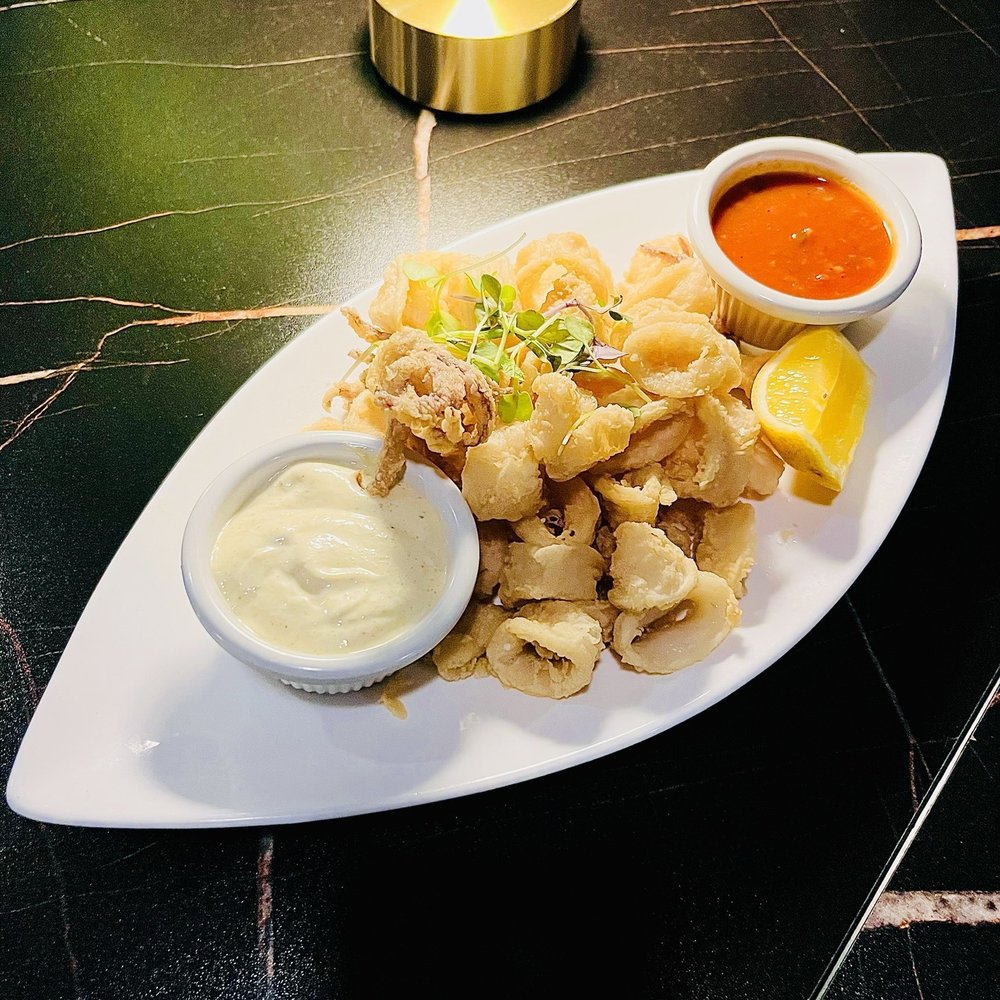 S'Aimer - Fried squid with tartare sauce and lemon - Lounges Near Me - New York, New York S'Aimer - Fried squid with tartare sauce and lemon - Lounges Near Me - New York, New York