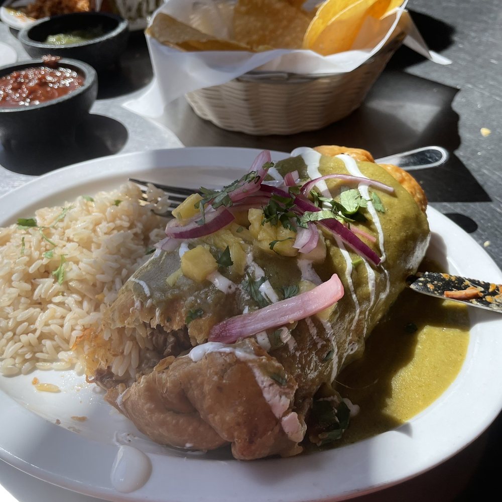 Sonora Grill - Sweet pork chimichanga (with green sauce) - Mexican Near Me - Ogden, Utah