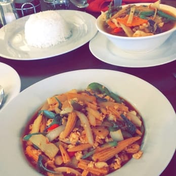 Sticky Rice - Thai basil chicken and jungle curry chicken in the back - Laotian Near Me - Murphy, Texas Sticky Rice - Thai basil chicken and jungle curry chicken in the back - Laotian Near Me - Murphy, Texas
