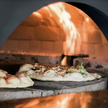 Ethan's Pizza - two pizzas cooking in a brick oven - Pizza Near Me - Paramus, New Jersey