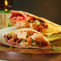 Little Angel Burgers and Wings - Jtown - Divine Angel Chicken Wrap: sliced fried chicken breast with slices pickles, tomato, onion, lettuce, ranch, and turkey bacon