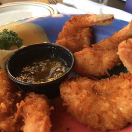 Coconut fried shrimp at happy hour are only $1.25 each. Coconut fried shrimp at happy hour are only $1.25 each.
