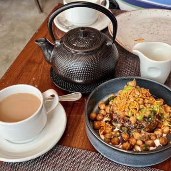 Saffron NOLA - Aloo Tiffin Chaat and Masala Chai Tea - Indian Near Me - New Orleans, Louisiana Saffron NOLA - Aloo Tiffin Chaat and Masala Chai Tea - Indian Near Me - New Orleans, Louisiana