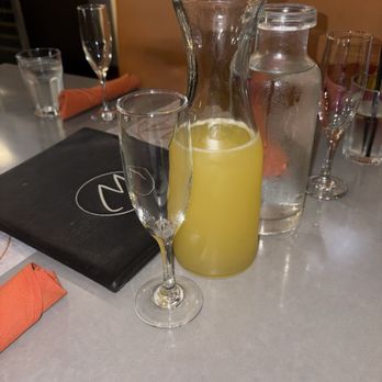 Wildwood Kitchen & Bar - Carafe of mimosas - New American Near Me - Sacramento, California Wildwood Kitchen & Bar - Carafe of mimosas - New American Near Me - Sacramento, California