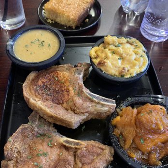 Jordyn's Brunch Cafe - Smothered pork chops gravy on the side, candied yams, sweet corn bread, and Mac & cheese - Soul Food Near Me - Chicago, Illinois Jordyn's Brunch Cafe - Smothered pork chops gravy on the side, candied yams, sweet corn bread, and Mac & cheese - Soul Food Near Me - Chicago, Illinois