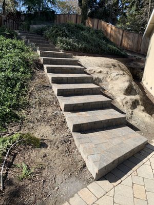 Paver steps - To install paver in this project we did remove the old steps and then we put a new form and pour concrete as of base for the pavers, yes we did lay the pavers over the concrete, doing this way the project will have more durability. We cover the top and sides to complete the project. This project took us 1 week to get it done.