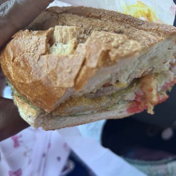 World Champion Smokehouse - Fish sandwich with fries or onion rings! $10.99 lettuce tomatoes mustard red onions! Yummy 1/28/2026 - Grocery Near Me - Oakland, California