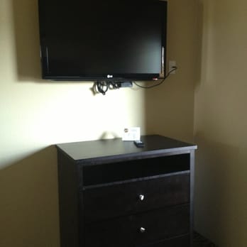 Explorer Cabins at Yellowstone - flat screen tv in one of the bedrooms - Hotels Near Me - West Yellowstone, Montana Explorer Cabins at Yellowstone - flat screen tv in one of the bedrooms - Hotels Near Me - West Yellowstone, Montana