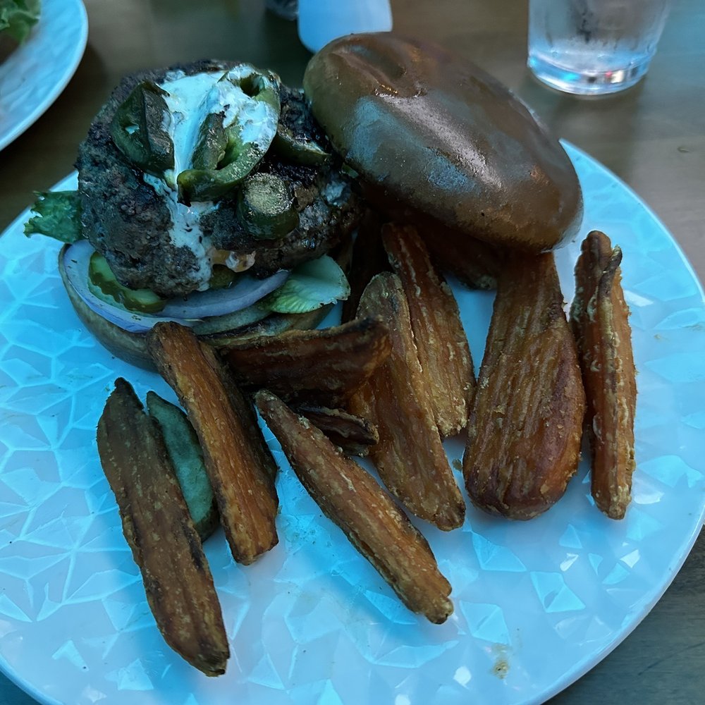 Lake Eustis Waterfront Grille - Jalapeño popper burger $14.99 with sweet potato fries (up charge $3) - Seafood Near Me - Eustis, Florida Lake Eustis Waterfront Grille - Jalapeño popper burger $14.99 with sweet potato fries (up charge $3) - Seafood Near Me - Eustis, Florida