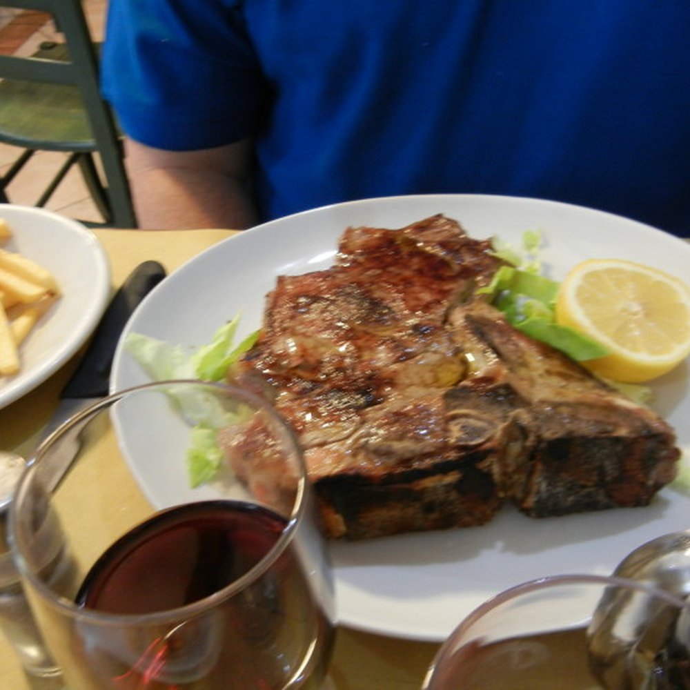 Trattoria da Giorgio - Special t-bone steak and fried potatoes (aka french fries). - Tuscan Near Me - Florence, FI Trattoria da Giorgio - Special t-bone steak and fried potatoes (aka french fries). - Tuscan Near Me - Florence, FI