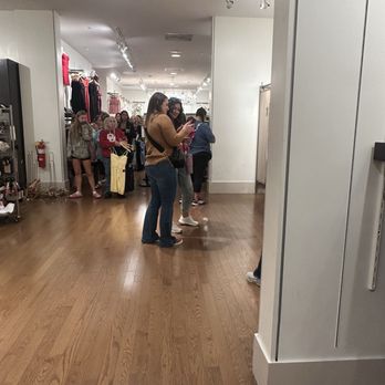 Windsor - Fitting room line stretched half the stores' length - Accessories Near Me - Omaha, Nebraska