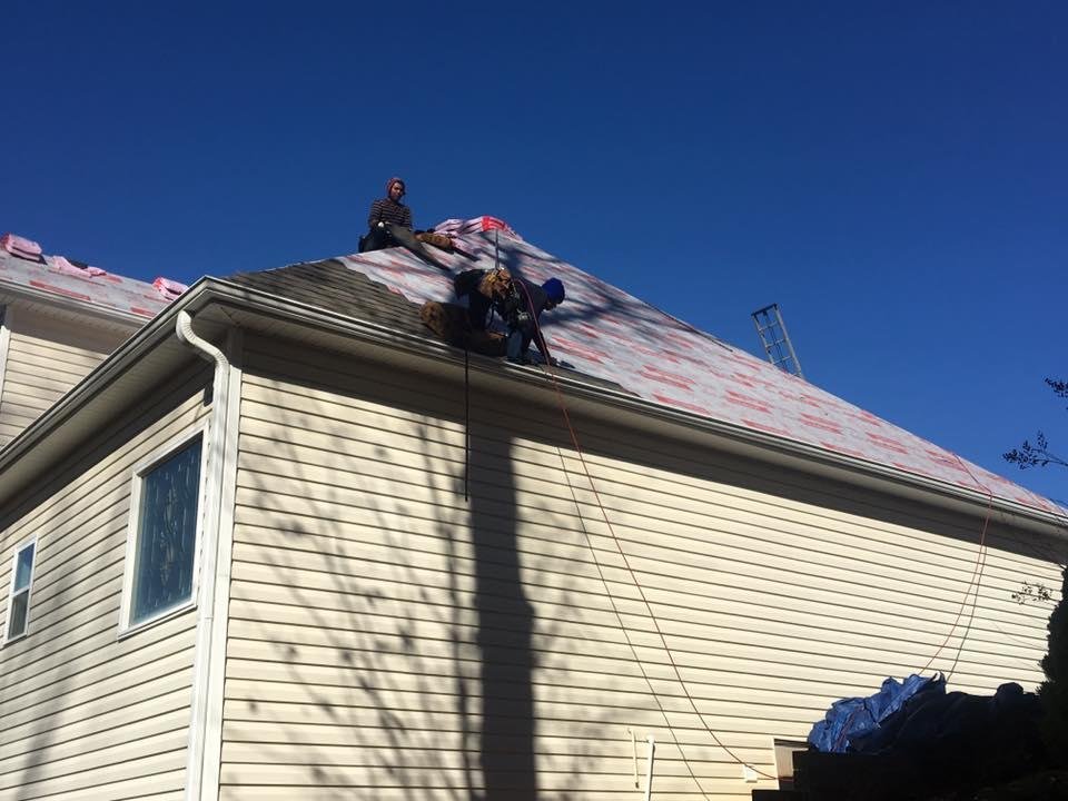Slide of Rainblocker Roofing & Construction