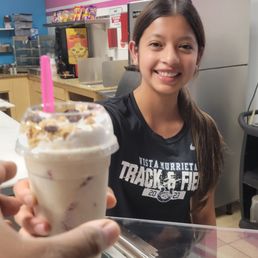 Abby handing me a delicious Fresas con Crema! Abby handing me a delicious Fresas con Crema!