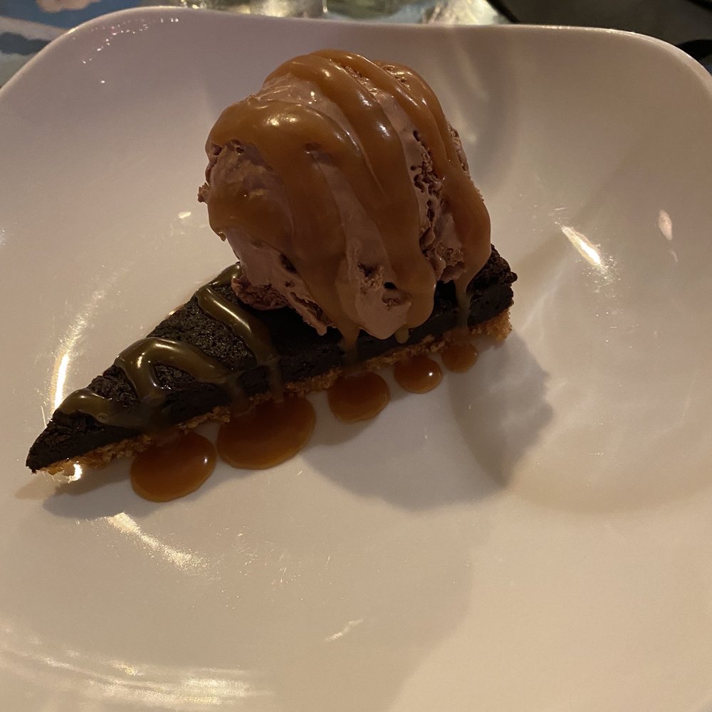 The Fiction Kitchen - Coconut chocolate tart with caramel ice cream - Vegan Near Me - Raleigh, North Carolina The Fiction Kitchen - Coconut chocolate tart with caramel ice cream - Vegan Near Me - Raleigh, North Carolina