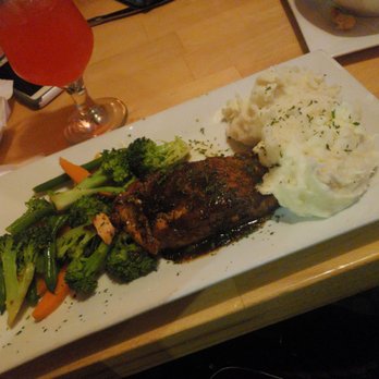 Fusion East - Jerk salmon, garlic mash, and substituted the collard greens for steam veggies. I enjoyed - Caribbean Near Me - Brooklyn, New York