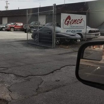 Gene's Transmissions - Trans Am ran into the metal gate right below Gene's transmissions business sign. - Transmission Repair Near Me - Quincy, Illinois Gene's Transmissions - Trans Am ran into the metal gate right below Gene's transmissions business sign. - Transmission Repair Near Me - Quincy, Illinois