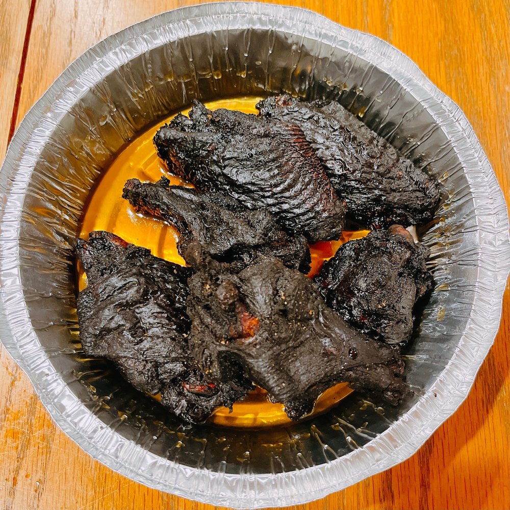 Black Bear Pizza - Blackened with honey wings - they look crazy but they aren't bad at  all. - Pizza Near Me - Asheville, North Carolina