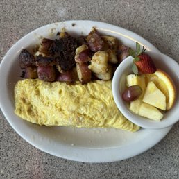Ham & Cheese omelette with fruit and home fries Ham & Cheese omelette with fruit and home fries