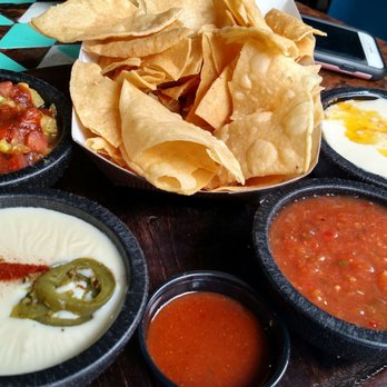 Condado Tacos - The only.was to go is sampler platter of salsa and cheese dip - Bars Near Me - Cincinnati, Ohio