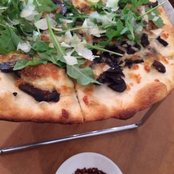 UNA Pizza + Wine - 17th Ave - Mushroom pizza with chilli flakes - Pizza Near Me - Calgary, Alberta UNA Pizza + Wine - 17th Ave - Mushroom pizza with chilli flakes - Pizza Near Me - Calgary, Alberta