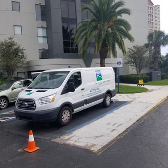 Helpro Cleaning Services - Hellpro van parked clearly in handicap space - Carpet Cleaning Near Me - Orlando, Florida