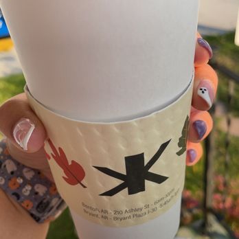 Koffee With a Kause - a person holding a coffee cup - Coffee & Tea Near Me - Bryant, Arkansas Koffee With a Kause - a person holding a coffee cup - Coffee & Tea Near Me - Bryant, Arkansas