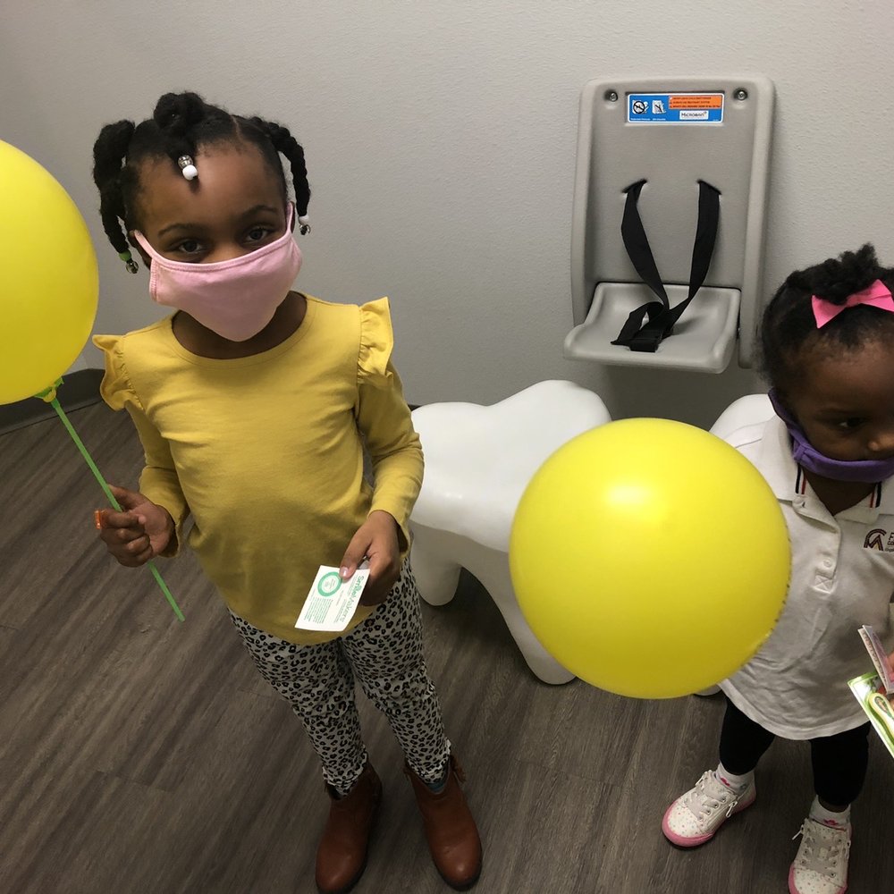 Kids@Heart Pediatric Dentistry - They earned balloons after their successful visit - General Dentistry Near Me - Cedar Hill, Texas