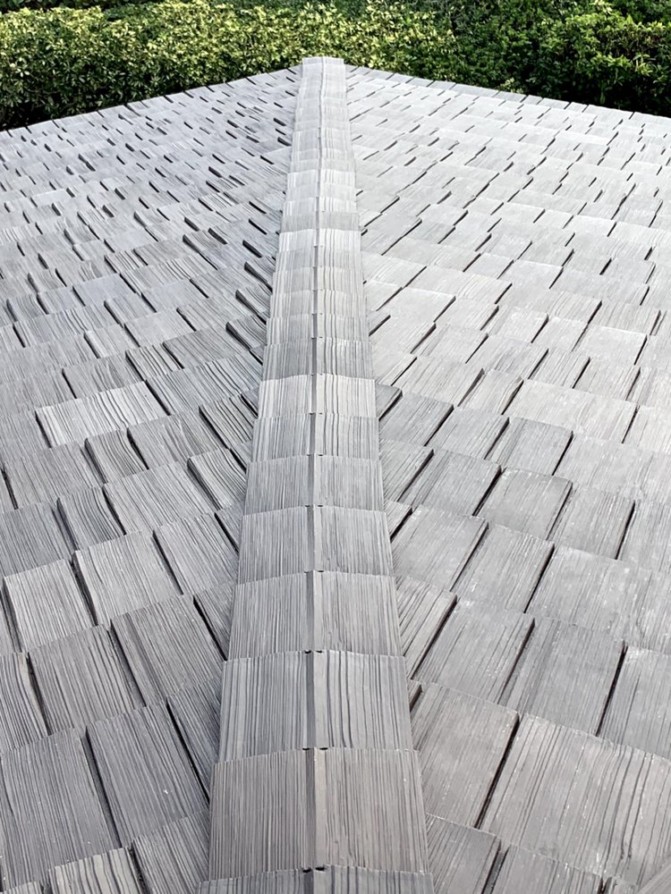 Slide of Louis Roofing