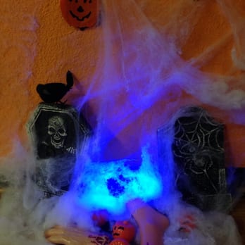 Poker Lounge - a halloween scene with a blue light - Lounges Near Me - Eugene, Oregon