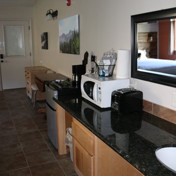 Hidden Canyon Retreat - ADA King Standard room sink, kitchenette, and bistro table. Wide enough for accessibility. - Vacation Rentals Near Me - Baker, Nevada Hidden Canyon Retreat - ADA King Standard room sink, kitchenette, and bistro table. Wide enough for accessibility. - Vacation Rentals Near Me - Baker, Nevada