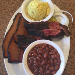 R & R Barbeque - 2 meat combo with beef ribs, sliced brisket, potato salad and baked beans.