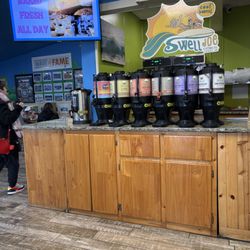 Surf Bagel - Coffee options in the waiting area.