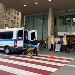 Absolute Senior Solutions - Absolute Transportations after dropping off a patient by gurney safely for surgery.