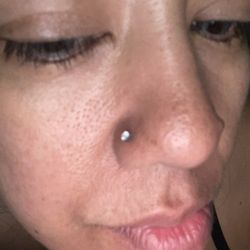 Tommy T's Body Piercing - Healed nose piercing