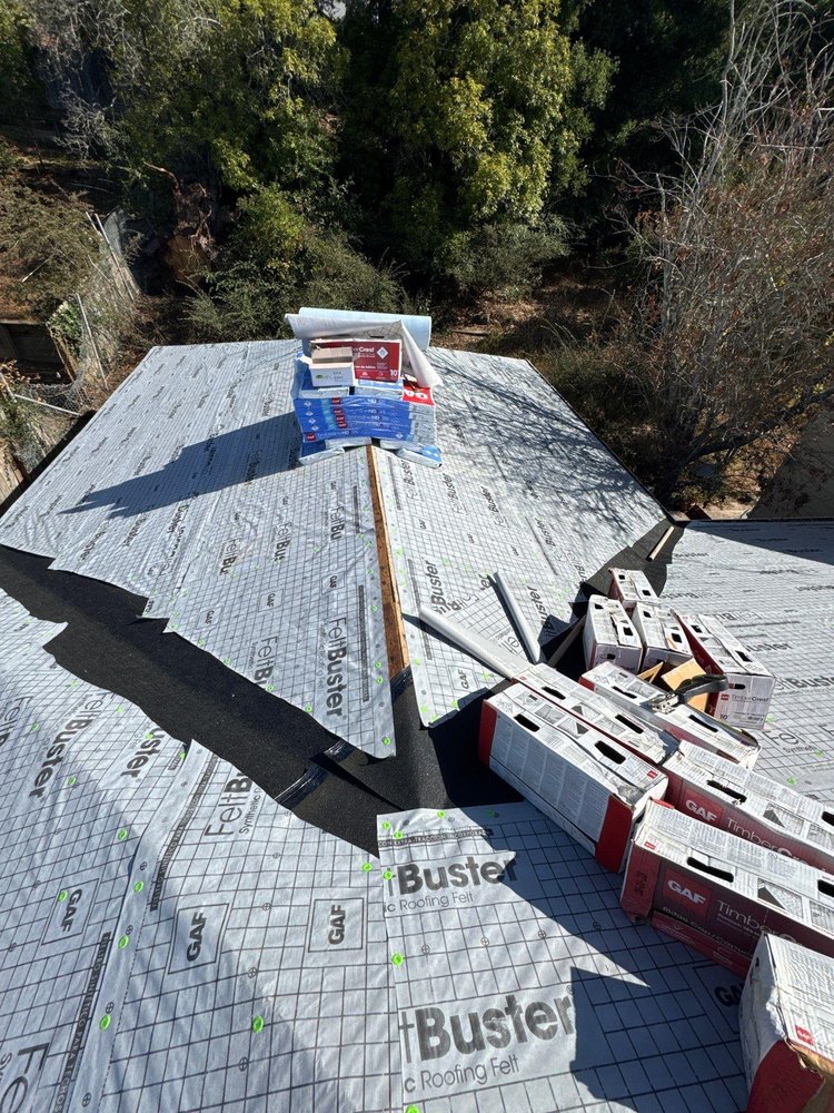 Slide of Acker Roofing