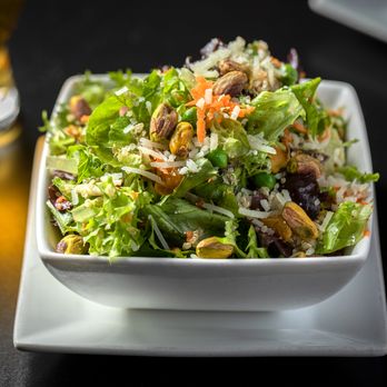 The Bad Apple - a bowl of salad with nuts - Burgers Near Me - Chicago, Illinois