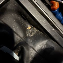 Sparkling Image Car Wash - Gear shift area with missed dirt.