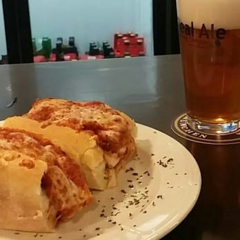 Leander Beer Market - Chicken parm and a 60 minute Dogfish head IPA. - Sports Bars Near Me - Leander, Texas Leander Beer Market - Chicken parm and a 60 minute Dogfish head IPA. - Sports Bars Near Me - Leander, Texas