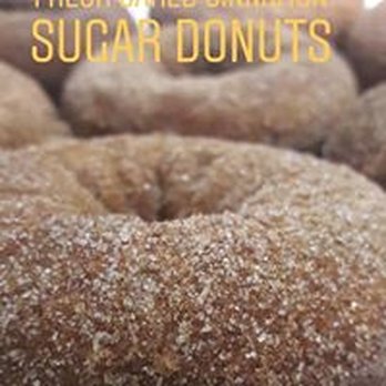 Riley’s Vegan Sweets And Eats - a pile of sugared donuts - Cupcakes Near Me - Peoria, Illinois Riley’s Vegan Sweets And Eats - a pile of sugared donuts - Cupcakes Near Me - Peoria, Illinois
