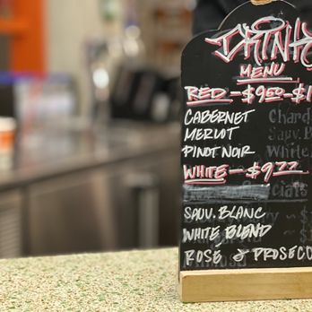 La Grande Orange - a menu board on a counter - Pizza Near Me - Phoenix, Arizona