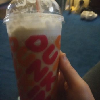 Dunkin' -  a person holding a drink in their hand - Donuts Near Me - Kingston, Pennsylvania