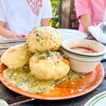 Pizza Bruno - Garlic Knots with Sauce - Pizza Near Me - Orlando, Florida Pizza Bruno - Garlic Knots with Sauce - Pizza Near Me - Orlando, Florida