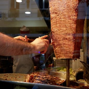 Sofra Mediterranean Cuisine - a man preparing food - Mediterranean Near Me - Richmond Hill, Ontario